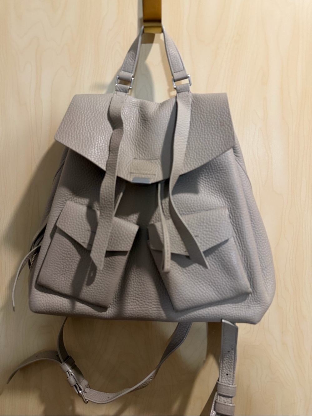 All Saints Pebbled Leather Backpack in Taupe